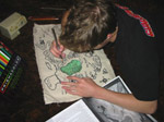 Jake Heberling draws the hand sewn reproduction of the Myth map.